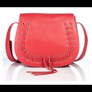 Brand new never used still in plastic Violetta coral saddle bag